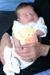 IMG_2713 Mom holding her first great-grandchild Aidan.